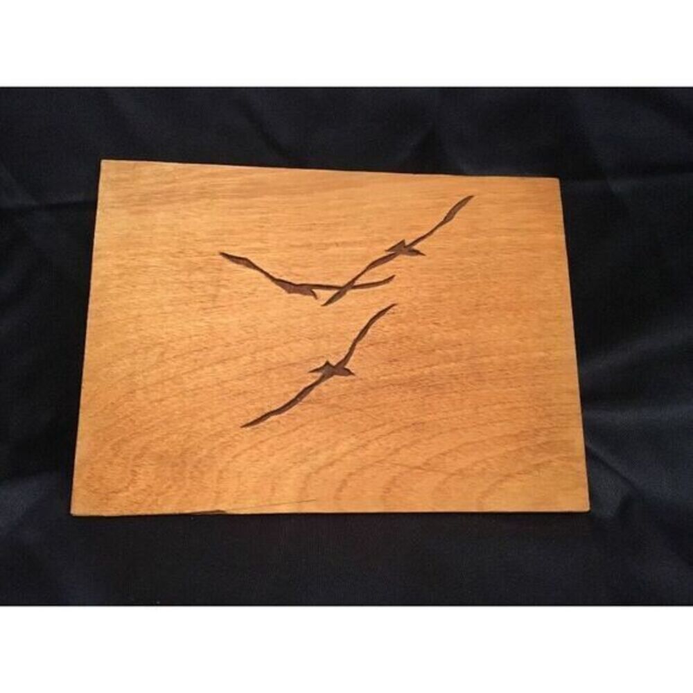 Seagulls‎ carved on plywood